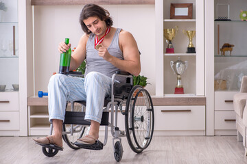Man ex-champion in wheel-chair suffering from alcoholism
