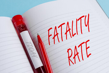 Handwriting text writing Fatality Rate. Conceptual photo calculated number of deaths over a...