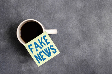 Word writing text Fake News. Business photo showcasing false information publish under the guise of...