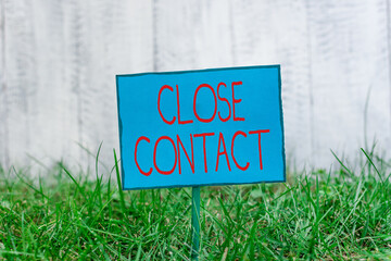 Conceptual hand writing showing Close Contact. Concept meaning having a history of direct exposure...