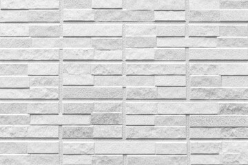 Modern white stone brick wall pattern and seamless background