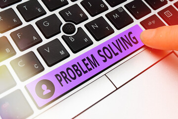 Conceptual hand writing showing Problem Solving. Concept meaning process of finding solutions to...