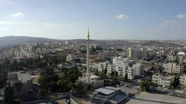 Golden Mosque Tower Minaret in Beit Hanina, Jerusalem, Aerial 
Palestinian Muslim Mosque Masjed aldaoa, Drone 
