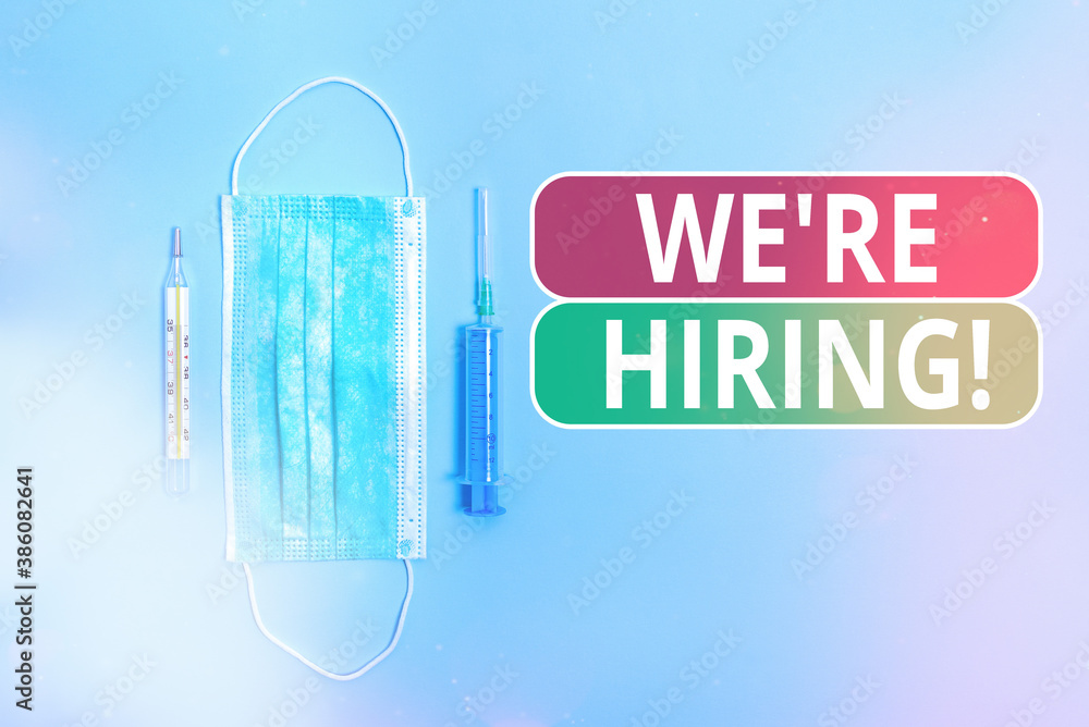 Poster handwriting text writing we re hiring. conceptual photo process of reviewing applications and findin