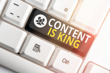 Writing note showing Content Is King. Business concept for believe that content is central to the...