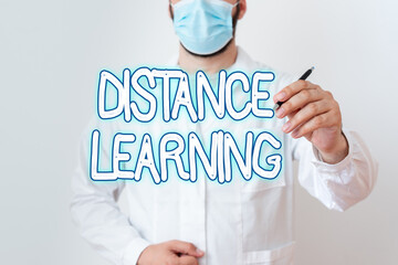 Writing note showing Distance Learning. Business concept for educational lectures broadcasted over the Internet remotely Laboratory Technician Featuring Sticker Paper Smartphone
