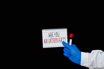 Conceptual hand writing showing Are You An Introvertquestion. Concept meaning an individual who...