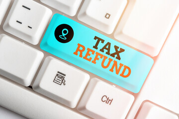 Handwriting text Tax Refund. Conceptual photo refund on tax when the tax liability is less than the...