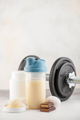 Fototapeta na wymiar Protein sport shake, powder eggs and bar. Fitness food and drink. Diet