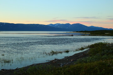 Light summer night at lake Tornetrask in northern Sweden