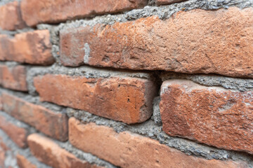 Rough red brick wall 5