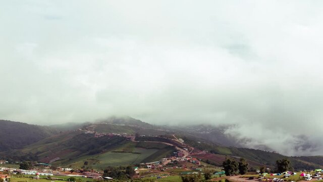 Bright morning weather in a small community amidst beautiful clouds.