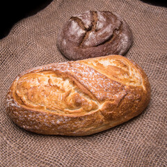 Rye bread,white bread on the table close-up,with space for text