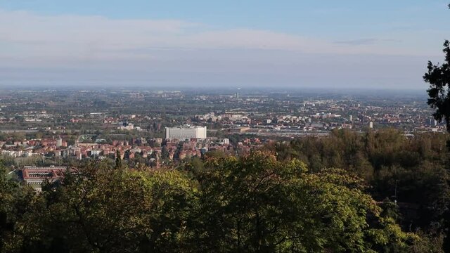 Cityscape of Bologna, Italy, focused on Maggiore Hospital and Marconi airport.