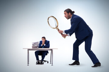 Concept of employee monitoring by boss
