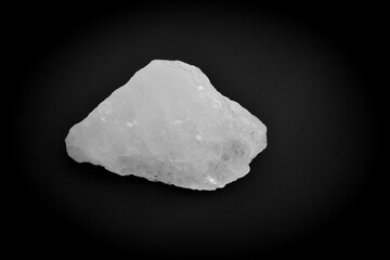 Fototapeta premium White alum cubes on black background, concept for applying underarms to reduce body odor and swing the cloudy water into the sediment.