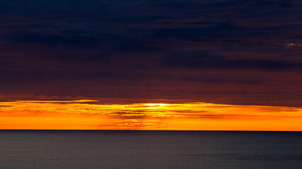Panoramic nature background (mountains, sea, trees, twilight lights in the sky, waterfront communities), naturally blurred through the wind, seen on tourist spots or scenic spots