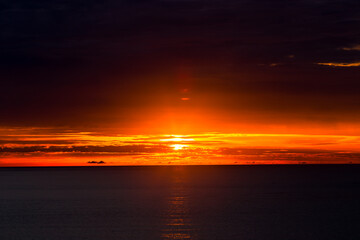 Panoramic nature background (mountains, sea, trees, twilight lights in the sky, waterfront communities), naturally blurred through the wind, seen on tourist spots or scenic spots