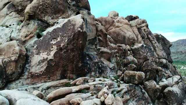 Pedestal up view of unique rocks and valley in Joshua Tree National Park