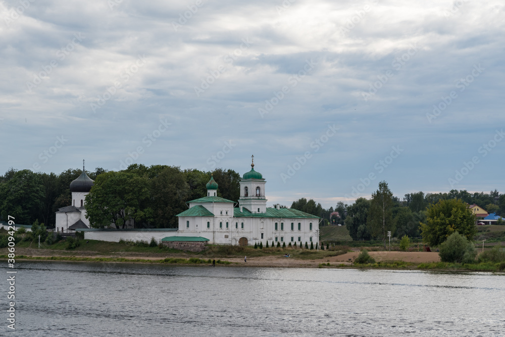 Poster The Mirozhsky monastery. Spaso-Preobrazhensky Cathedral (12th century) and Stefanovskaya Church (17th century), Pskov, Russia