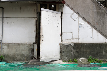 sidewalk by street wall & door