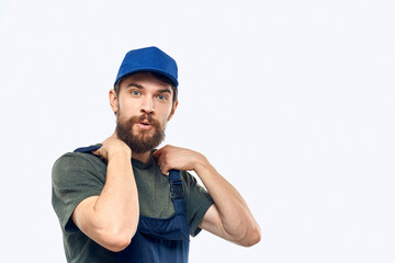 Worker man uniform delivery service emotions studio light background