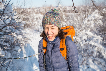 Fototapeta na wymiar Woman on a winter hike.