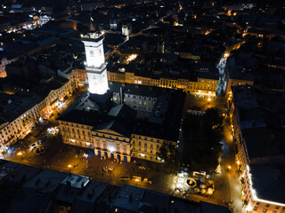 night aerial view of old european city with tight streets