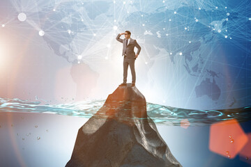 Businessman desperate on desert island in business concept