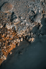 Noboribetsu, Hokkaido Japan - September 5th 2019: Detail shot of the volcanic ground textures at Jigokudani (Hell Valley).
