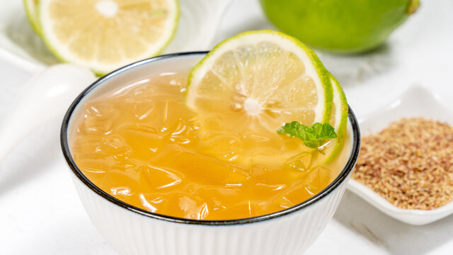 Delicious Taiwanese food - cold drinking dessert Aiyu ice jelly with lemon.