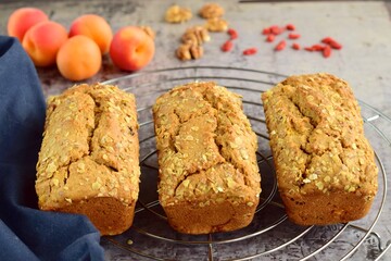 Apricot walnut goji berry oat loaf cake. Selective focus