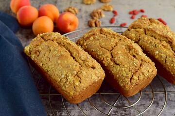 Apricot walnut goji berry oat loaf cake. Selective focus