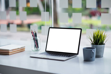 Mock up. Tablet with keyboard with blank screen in office.