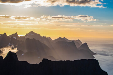 Sunset and mountain silhouettes in Senja Island, Norway