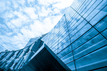 Looking Up Blue Modern Office Building