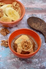 Banana chocolate peanut butter ice cream with walnut