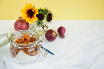Indonesian crispy deep fried shallots or onion flakes (bawang goreng) in a jar