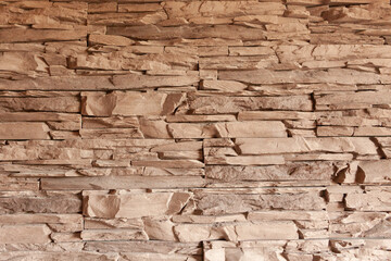 background from small bricks. exterior wall decoration