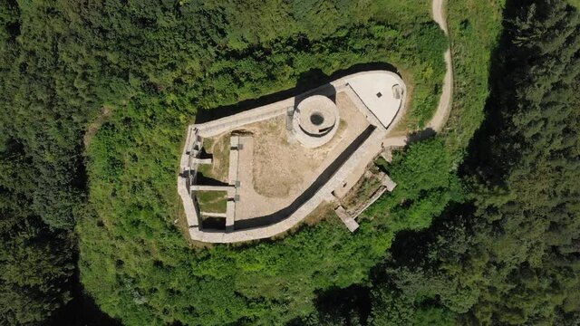 Medieval Castle in mountain woods in summer. View of directly above. Village Rytro, Beskid Sadecki, Poland.