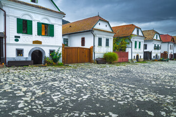 Traditional old rural white houses in row, Rimetea, Transylvania, Romania
