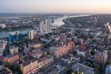 Fototapeta na wymiar ROSTOV-ON-DON, RUSSIA - SEPTEMBER 2020: Evening panorama of Rostov-on-Don, view of the Don River and the central part of the city. Aerial view