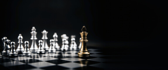 King golden chess standing confront of the silver chess team to challenge concepts of leadership and business strategy management and leadership - obrazy, fototapety, plakaty