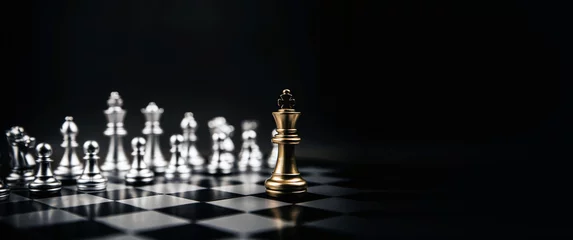 Tuinposter King golden chess standing confront of the silver chess team to challenge concepts of leadership and business strategy management and leadership © Eakrin