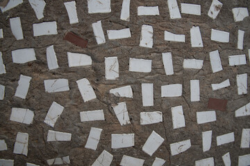 Background of concrete and pieces of ceramic tiles. Texture, background.