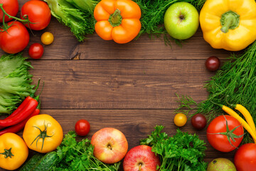 Healthy eating ingredients: fresh vegetables, fruits and superfood. Wooden background