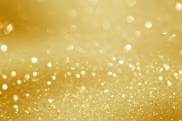abstract defocused lights, sparkling holiday bokeh background with golden tones, elegant christmas backdrop
