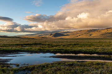 Amazing, stunning landscape of the sunset sky against the background of hills and open space, Kamchatka, Russia