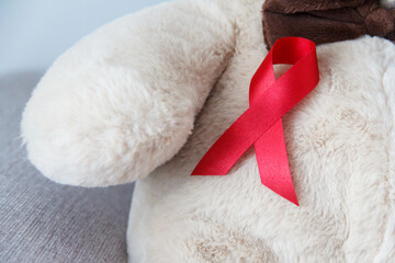 red AIDS awareness ribbon. World aids day and healthcare and medicine concept