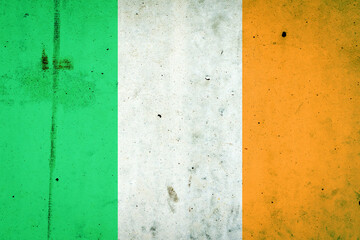 Ireland flag on a concrete wall. Flags.